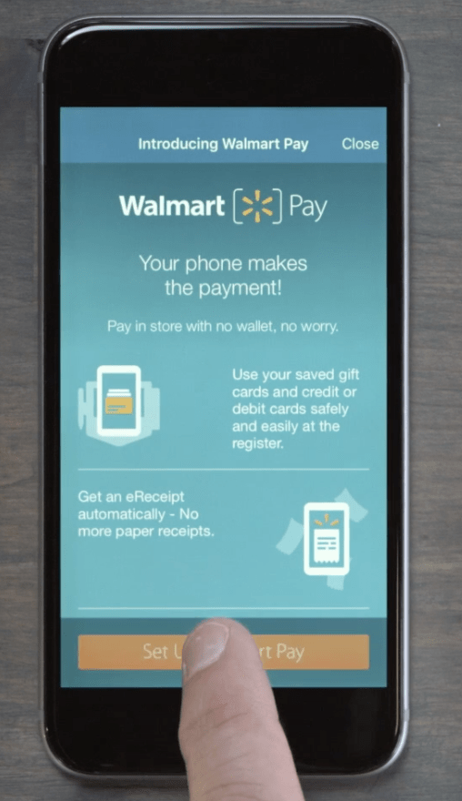 A Iphone featuring the Walmart Pay app dashboard.